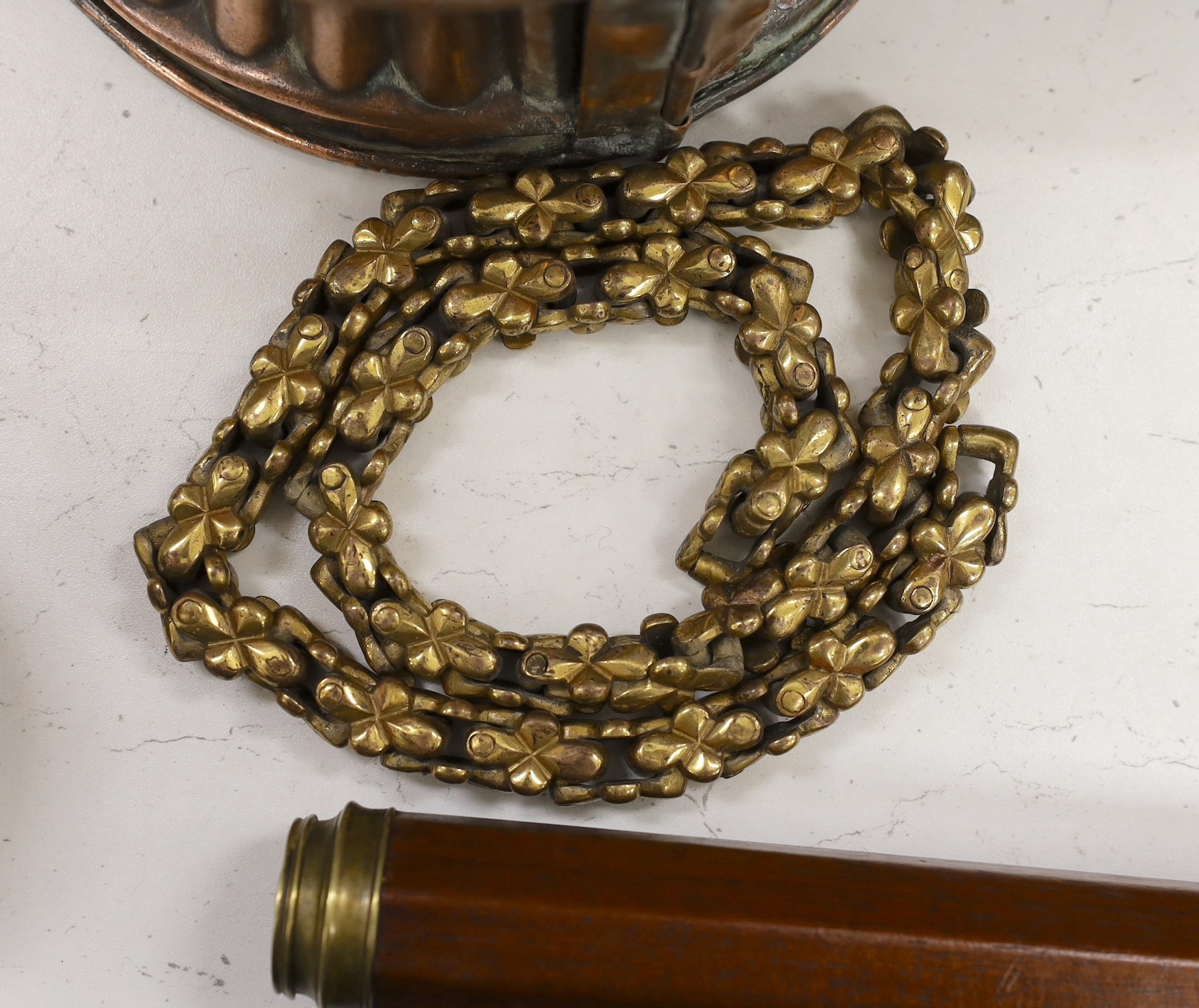 An unusual Victorian copper pie-mould, teak cased set of Bezique scorers, a brass link chain, a 19th century pewter pitcher, an Art Nouveau oil lamp, and two other items
